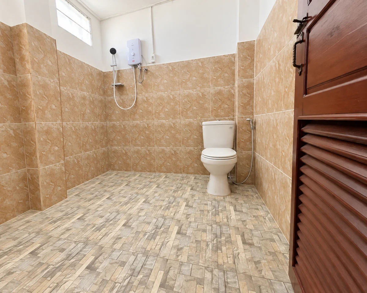 A tiled bathroom in the supplied Florian room photographs